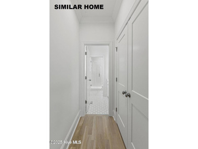 Discover unparalleled coastal living at 607a S Topsail Drive