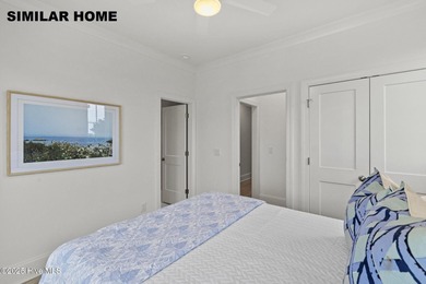 Discover unparalleled coastal living at 607a S Topsail Drive