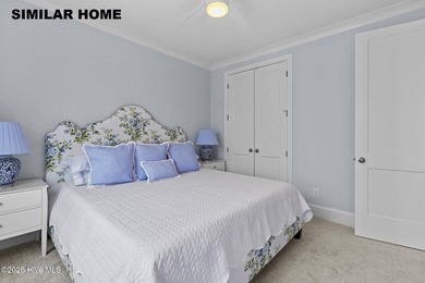 Discover unparalleled coastal living at 607a S Topsail Drive