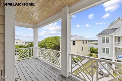 Discover unparalleled coastal living at 607a S Topsail Drive