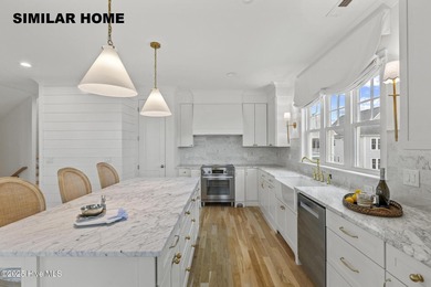 Discover unparalleled coastal living at 607a S Topsail Drive