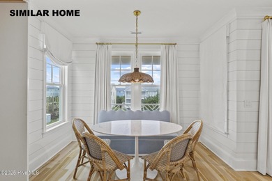 Discover unparalleled coastal living at 607a S Topsail Drive