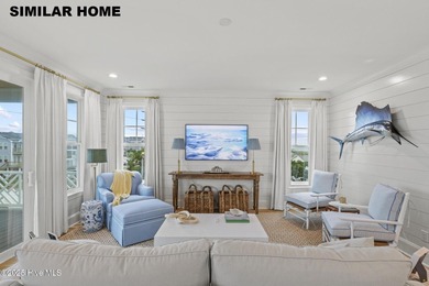 Discover unparalleled coastal living at 607a S Topsail Drive
