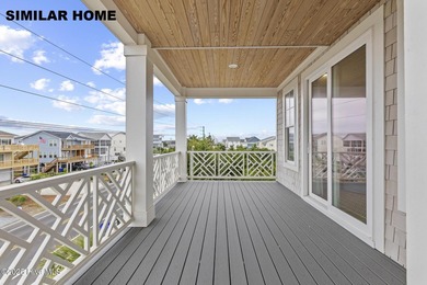 Discover unparalleled coastal living at 607a S Topsail Drive