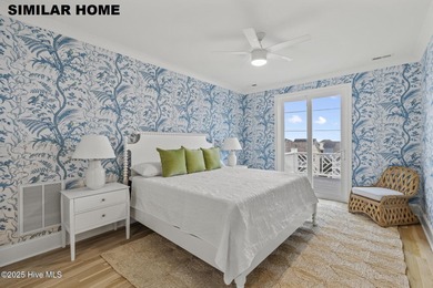 Discover unparalleled coastal living at 607a S Topsail Drive