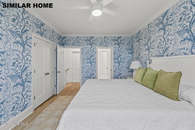 Discover unparalleled coastal living at 607a S Topsail Drive