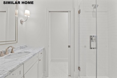 Discover unparalleled coastal living at 607a S Topsail Drive