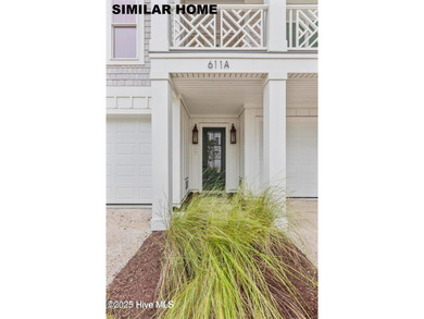 Discover unparalleled coastal living at 607a S Topsail Drive