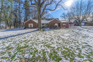 Welcome home to this beautifully maintained brick ranch situated