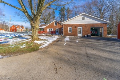 Welcome home to this beautifully maintained brick ranch situated