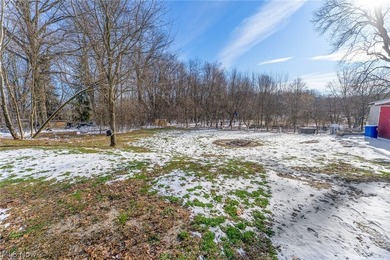 Welcome home to this beautifully maintained brick ranch situated