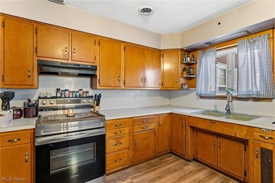 Welcome home to this beautifully maintained brick ranch situated