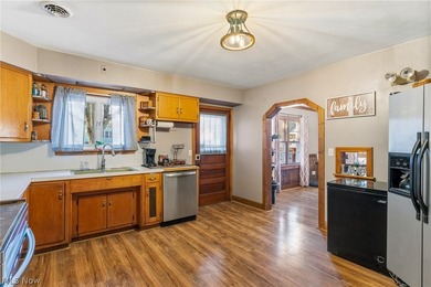 Welcome home to this beautifully maintained brick ranch situated