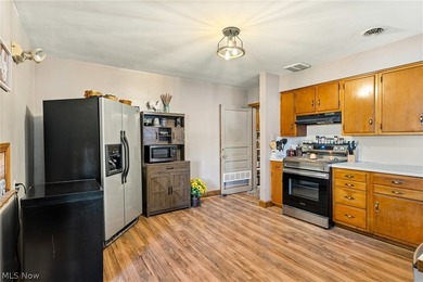 Welcome home to this beautifully maintained brick ranch situated