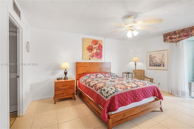 East Boca living just 1 mile from the beach. This bright 1,300