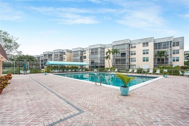 East Boca living just 1 mile from the beach. This bright 1,300
