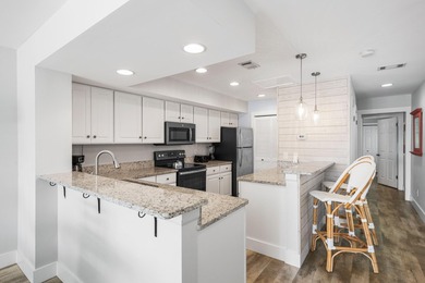 Coveted top-floor corner unit on the Links Golf Course with - photo 8