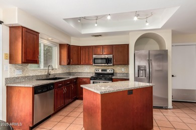 This beautifully updated two-story townhome in Ahwatukee is