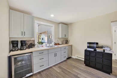 Seize a rare opportunity to own a meticulously renovated nine - photo 16