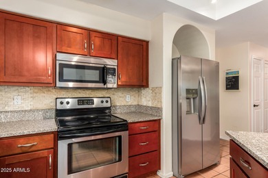 This beautifully updated two-story townhome in Ahwatukee is