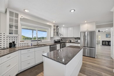 Seize a rare opportunity to own a meticulously renovated nine - photo 21