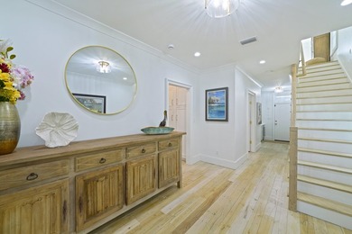 Designed by Robert Orr, this home is perfectly positioned on a - photo 4