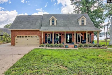Nestled on a beautifully private one-acre lot along the shores - photo 2