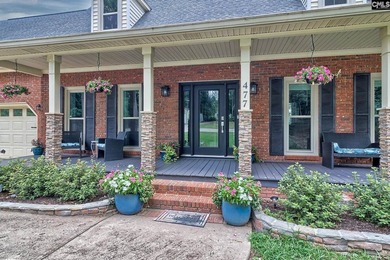Nestled on a beautifully private one-acre lot along the shores - photo 3
