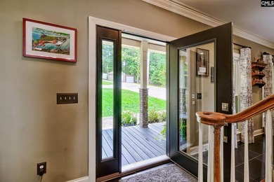 Nestled on a beautifully private one-acre lot along the shores - photo 4