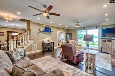 Nestled on a beautifully private one-acre lot along the shores - photo 6