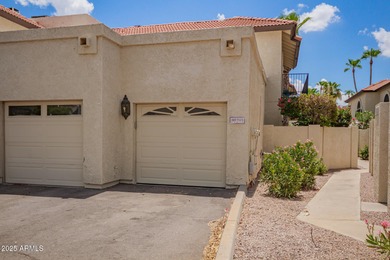 This beautifully updated two-story townhome in Ahwatukee is