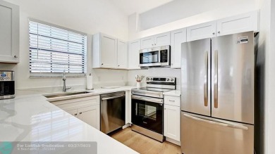 Lake Condo For Sale in Deerfield Beach, Florida