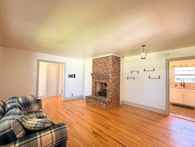 Settle into this warm home, featuring a wood burning fireplace - photo 16