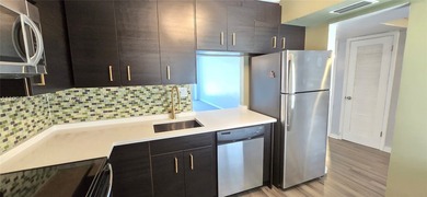 NEW IMPROVED PRICE. **Impact windows and slider thru-out this - photo 2