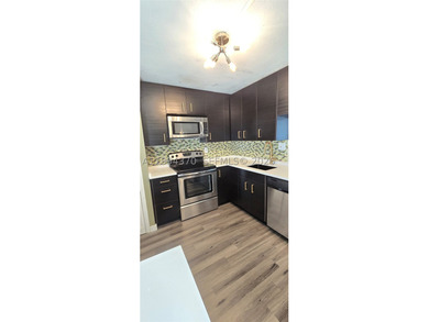 NEW IMPROVED PRICE. **Impact windows and slider thru-out this - photo 7