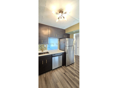 NEW IMPROVED PRICE. **Impact windows and slider thru-out this - photo 8