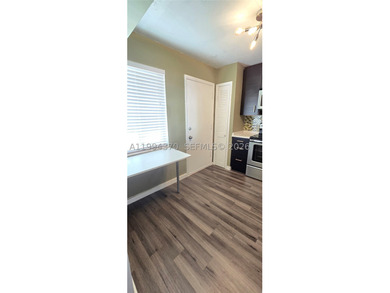 NEW IMPROVED PRICE. **Impact windows and slider thru-out this - photo 9