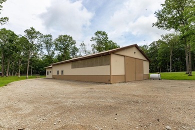 Nestled deep within 60 acres of pristine woodland just 15 - photo 37