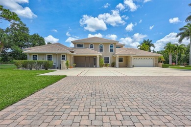 Exclusively situated on 5.1 expansive acres, this custom-built - photo 7