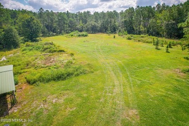 This also includes Parcel 002215-0010 which is a 2 acre lot that - photo 15