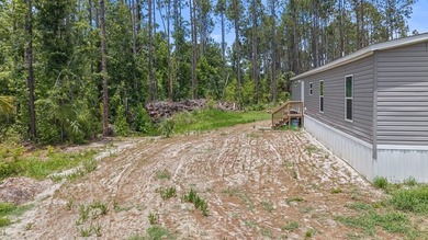 Looking for privacy, acreage, and room to roam? This like-new - photo 22