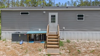 Looking for privacy, acreage, and room to roam? This like-new - photo 23