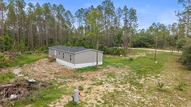 Looking for privacy, acreage, and room to roam? This like-new - photo 24