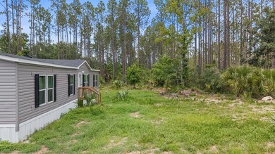 Looking for privacy, acreage, and room to roam? This like-new - photo 27