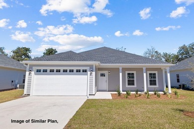 Experience the pinnacle of coastal living in the newly completed - photo 1