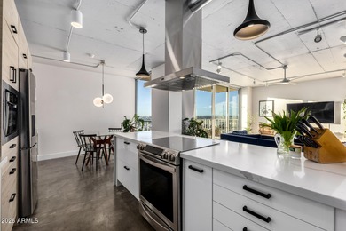 This stunning corner-unit apartment offers high-rise living with