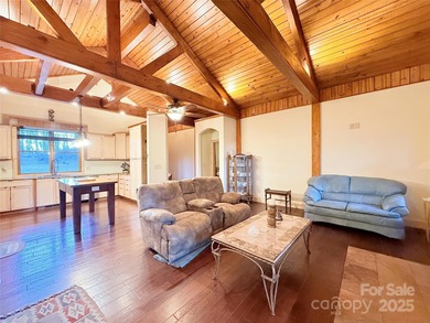 HANDICAP-accessible, ONE-story living on 4.4+/- rare, LEVEL