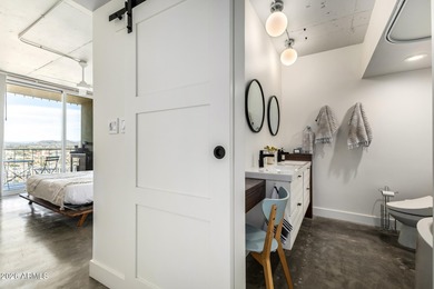 This stunning corner-unit apartment offers high-rise living with