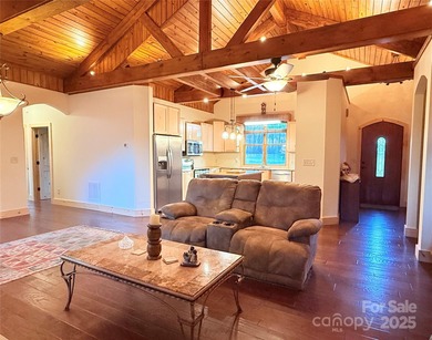 HANDICAP-accessible, ONE-story living on 4.4+/- rare, LEVEL