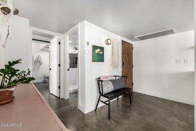 This stunning corner-unit apartment offers high-rise living with